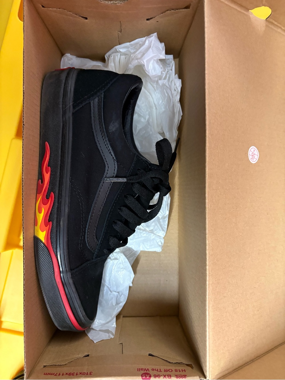 Vans Black Low-Top Sneakers with Red and Yellow Flame Graphic